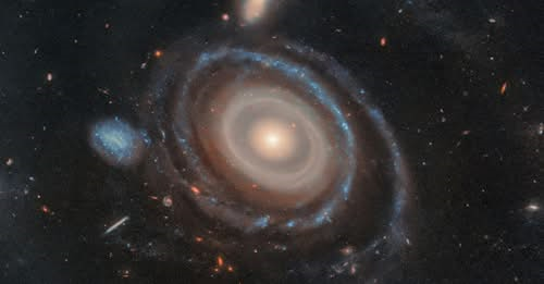 Hubble Reveals Cosmic Bullet That Gave The Bullseye Galaxy Its Record-Breaking Rings